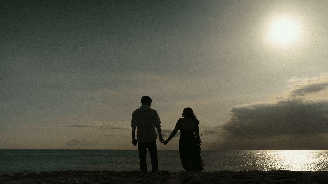Bea and Neil holding hands